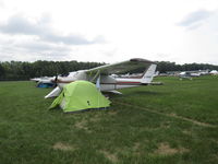 C-GNDP @ OSH - on field at EAA 18 - by Magnaman