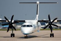 G-JECS @ EGCC - Impressive prop blades on this Flybe DHC8 - by FerryPNL