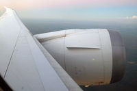 ZK-NZE - Flying into the night on the short 6-hour red-eye from Perth to Auckland - by Micha Lueck