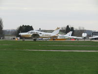 G-SNUZ @ EGBP - along with G-CLEA at flying club apron - Cotswold Airport - aka Kemble - by Magnaman