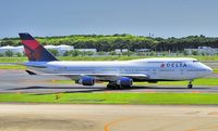 N673US @ RJAA - One of the last 747's - by JPC