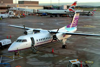 G-WOWB @ EGCC - G-WOWB   De Havilland Canada DHC-8Q-311A Dash 8 [334] (Air Southwest) Manchester-Ringway~G 15/12/2004 - by Ray Barber