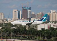 C-FWCN @ FLL - West Jet - by Florida Metal