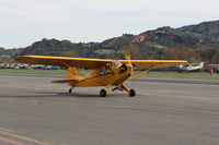 N6900H @ SZP - 1946 Piper J3C-65 CUB, Lycoming O-290 135 Hp big upgrade by STC, taxi to Rwy 04 - by Doug Robertson