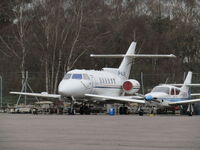 M-ALUN @ EGHH - nice 125 hiding in corner at Hurn - always worth a visit for biz or second hand 737s - by Magnaman