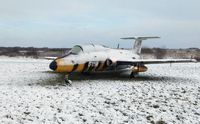 RA-01611 @ EGFH - Delfin in the snow. - by Roger Winser