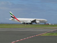 A6-ECS @ NZAA - You can do it says the caravan to the 777 - by Magnaman