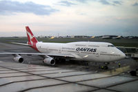 VH-OJS @ FAJS - Seen from Terminal 'A' at Johannesburg, in failing light, - by Neil Henry