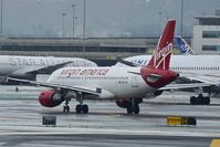 N527VA @ SFO - Departing runway 10. SFO 2019. - by Clayton Eddy