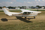 N5119Y @ OSH - Cessna T210N, c/n: 21064083 - by Timothy Aanerud