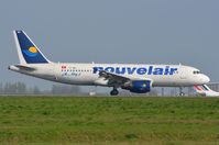 TS-INH @ LFPG - Nouvelair A320 arriving in CDG - by FerryPNL