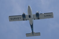 G-RVNJ @ EGJB - Photo me, photo you! Aerial photo survey of Guernsey in progress, overhead St Peter Port. - by alanh