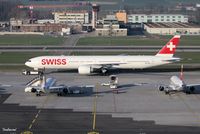 HB-JNH @ LSZH - Boeing 777-3DE(ER)   HB-JNH of Swiss International Air Lines under tow - by Strabanzer