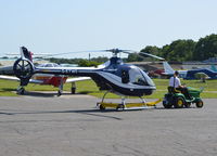 G-ETWO @ EGTF - Guimbal Cabri G2 being towed to the hangar at Fairoaks. - by moxy
