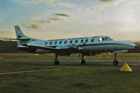 VH-EEF @ YMER - Kendell Airlines SA-226TC Metro II VH-EEF Cn TC331E at Merimbula Airport (YMER) at dusk in 1985. (Low Res photo.) - by Walnaus47