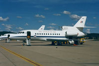 A26-070 @ YSCB - Port side view of RAAF 34 Squadron Falcon 900 A26-070 Cn 070 (and 'Sister-Ship' A26-076 at rear) at her RAAF Fairbairn 'home-base' in 1990. The five F900s were replaced by two Boeing B737 BBJs, and three Challengers in 2002. - by Walnaus47