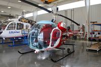 N474JP @ KJVL - In the Helicopter Specialties hangar - by Glenn E. Chatfield