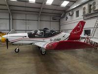 G-JHMP @ EGBT - Parked at her hanger - by James Lloyds