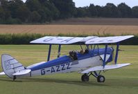 G-AZZZ @ EGTH - 1944 Tiger Moth taxiing for take-off at the 'Gathering of Moths' Day 2019 at Old Warden - by Chris Holtby