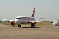 G-EZBZ @ EGGD - Taxiing to RWY 27 for departure - by Dominic Hall