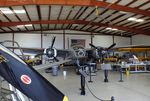 N7705C @ KADS - Douglas A-26C Invader in the maintenance hangar at the Cavanaugh Flight Museum, Addison TX - by Ingo Warnecke