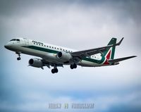 EI-RNA @ EGLC - Alitalia Embraer 190LR Cityliner Parco Naturale di Vesuvio coming in to land at London City Airport - by Yellow 14 Photography