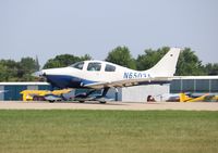 N65031 @ KOSH - Lancair LC42-550FG - by Mark Pasqualino