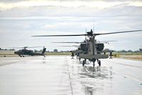 16-03110 @ KBOI - Taxiing Bravo behind 3 other AH-64Es. - by Gerald Howard