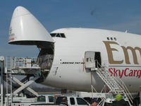 N408MC @ TOL - Emirates SkyCargo 747-400F (operated by Atlas Airlines) unloading for BAX Global - by Steven Lipstraw