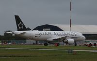 D-AIZM @ EGSH - Emerging from Air Livery hangar in Star Alliance livery - by AirbusA320