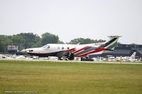 N711NX @ KOSH - Beech 35 Bonanza  C/N D-1096, N711NX - by Dariusz Jezewski www.FotoDj.com