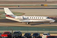 N365QS @ KLAX - Netjets Ce680 taxying to the FBO - by FerryPNL