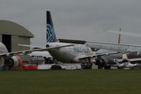 EI-GIZ @ EGBP - Parked at Kemble, still with Aigle Azur titles - by alanh