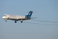 4O-AOM @ LOWW - Montenegro Airlines Fokker 100 - by Thomas Ramgraber