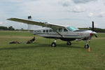 N228GS @ OSH - 2010 Cessna 208, c/n: 20800520 - by Timothy Aanerud
