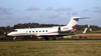 N550RP @ EGGW - departing from runway 26 - by Michael Vickers
