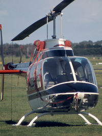 VH-BLR @ YMMB - Close-cropped Vertical aspect front view of Jayrow Helicopters Bell 206B JetRanger II VH-BLR Cn 1309 (in red-white-black livery) at Moorabbin YMMB in 1976. - by Walnaus47