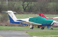 G-LFSR @ EGTR - Parked and covered at Elstree - by Chris Holtby