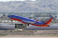 N604SW @ KPHX - taking off from Phoenix - by olivier Cortot