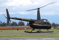 N220GG @ KRHV - Locally based 2009 Robinson R44 departing at Reid Hillview Airport, San Jose, CA. - by Chris Leipelt