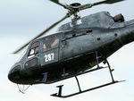 VH-BUK @ YSRI - Close-cropped rear Port side view of the front end of ‘JoyFlight’ Squirrel AS-350BA helicopter VH-BUK Firebird 287 at RAAF Base Richmond YSRI NSW during the Australian Defence Force Airshow on 22Oct2006. The helo had an unusual dark grey livery. - by Walnaus47