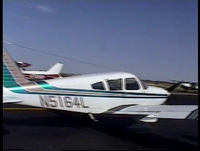 N5164L @ LXT - I rented this plane Oct 20 1999. My buddy Augie and I flew it for about an hour. It flew fine but it was just an old rental plane. The Plane photo is a still from a 8mm Sony digital video tape. I have quite a lot of flying video in this plane. - by Doug Jones