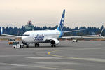 N589AS @ KSEA - Pushing back for departure - by Robert Kearney