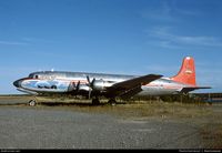 C-GPEG @ CYZF - C-118A to DC-6A. Owned by Calgary company to transport surplus P-51 aircraft and parts from Bolivia in exchange for surpus RCAF T-33 aircraft.
Stored in Yellowknife. Bought by Ron Fox and sold to Northern Air Cargo as N99330. Now Everetts. Derelict. - by Unknown