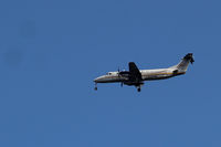 C-FJXO @ YBL - photographed a Beech 1900C  C-FJXO  over Campbell River headed for YBL  mid-afternoon on Aug 13, 2020... it is not a Beaver as stated above by the website - by douglas waller