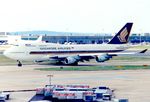 9V-SMF @ EGLL - At London Heathrow, early 1990's. - by kenvidkid