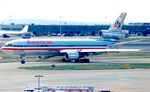 N144UA @ EGLL - At London Heathrow, early 1990's. - by kenvidkid