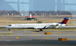 N135EV @ KJFK - Taxi for takeoff JFK - by Ronald Barker