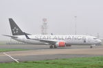 LN-RRE @ EGSH - Misty morning arrival at Norwich from Oslo. - by keithnewsome
