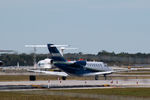 N850CP @ PBI - holding short for takeoff - by Bruce H. Solov